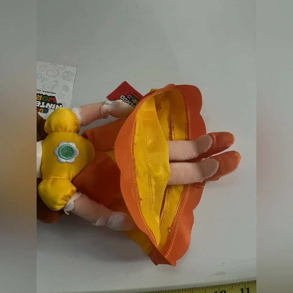 NWT Universal Studios Hollywood Super Nintendo World Princess Daisy Plush Doll
